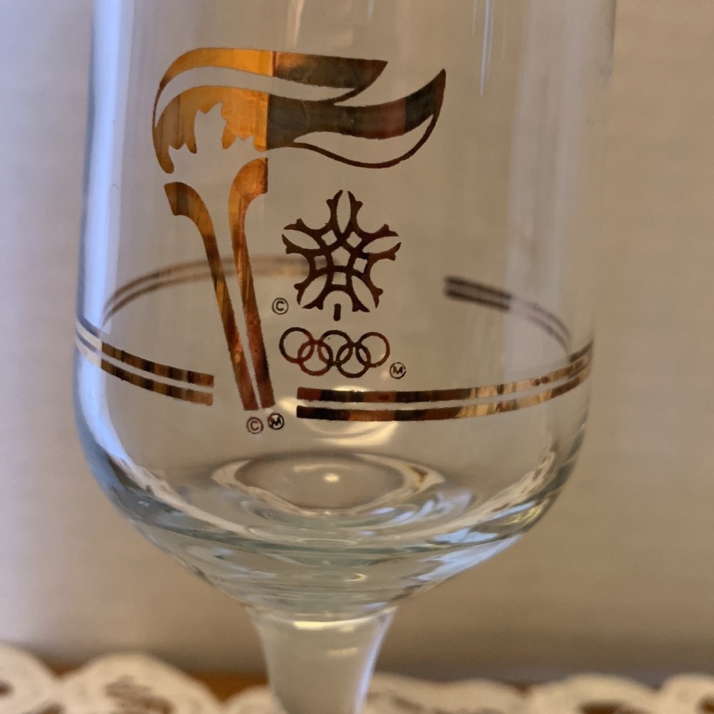 Six 1986 Petro-Canada Olympic Torch Champagne flutes with 22 karat gold design